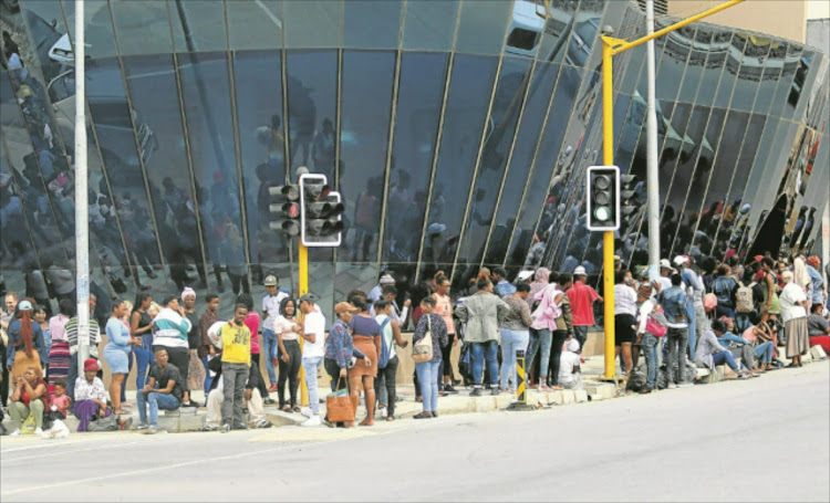 A lot of people were frustrated by poor service as they waited in a queue that snaked outside the East London Home Affairs.