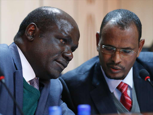 IEBC Chairman Wafula Chebukati in consultations with commissioner Abdi Guliye on July 5, 2018.