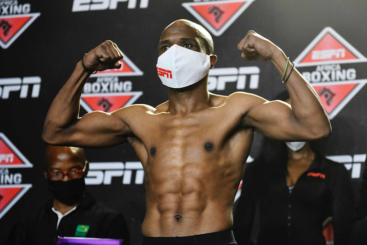 Koos Sibiya poses during the weigh-in on Wednesday.