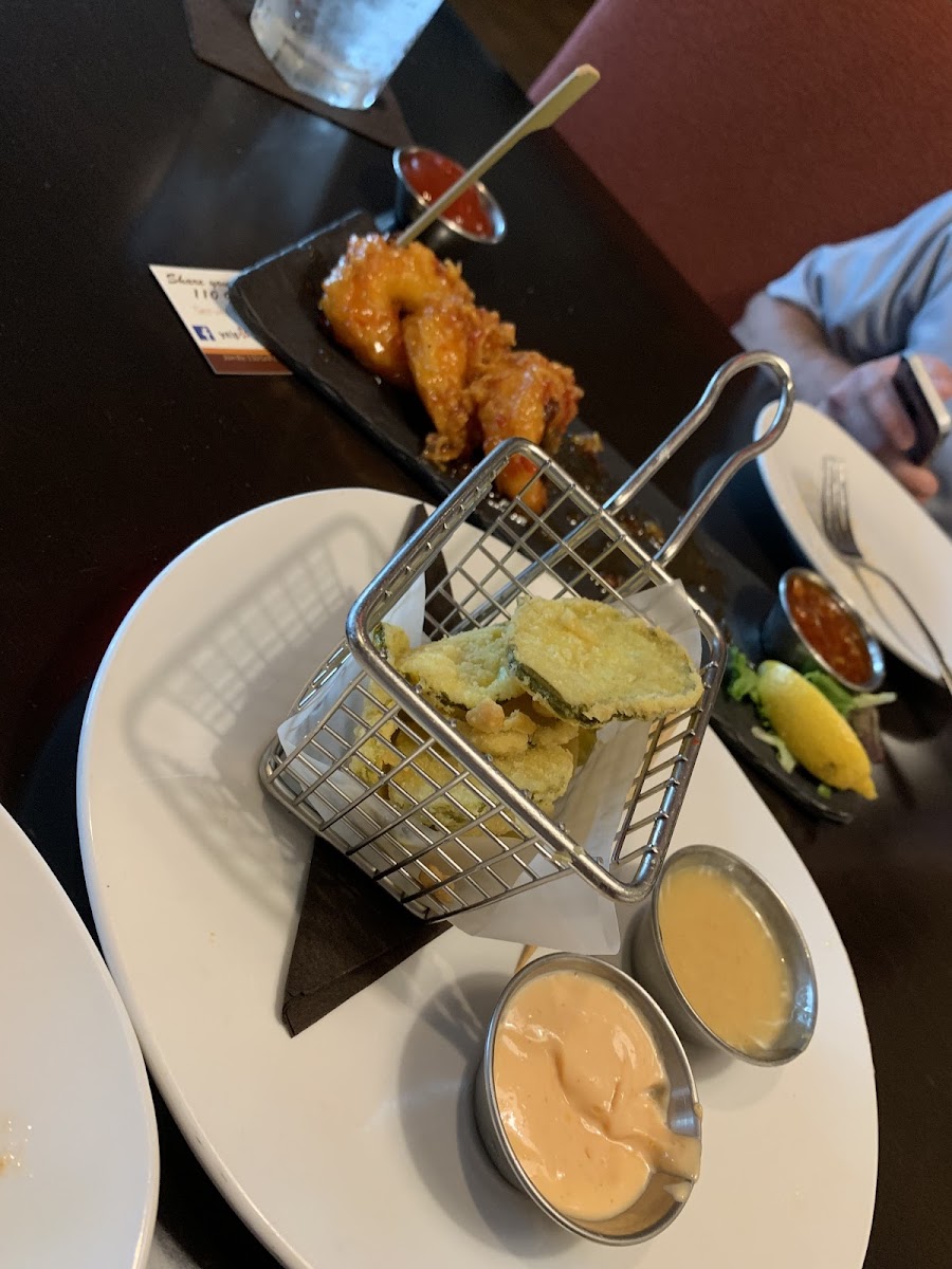 Gluten AND dairy free fried pickle chips and firecracker shrimp! 😋