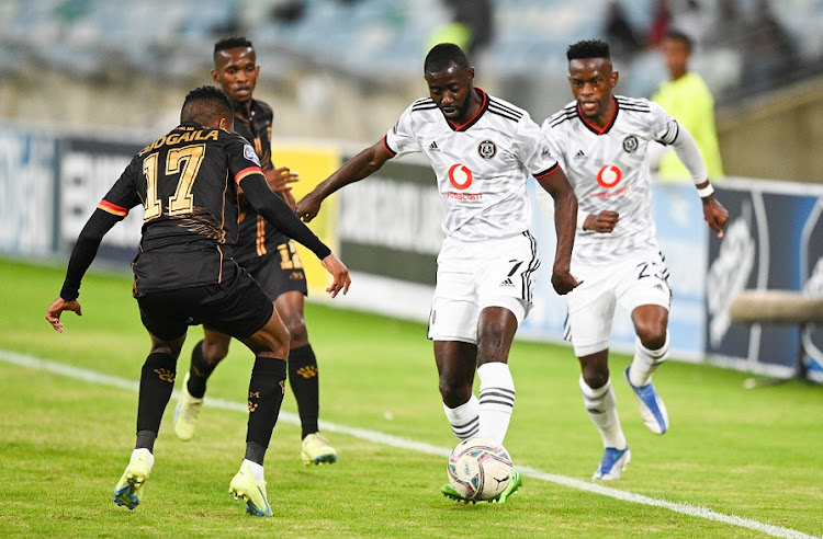 Deon Hotto of Orlando Pirates is challenged by Shaune Mogaila of Royal AM in the DStv Premiership match at Moses Mabhida Stadium in Durban on August 17 2022.