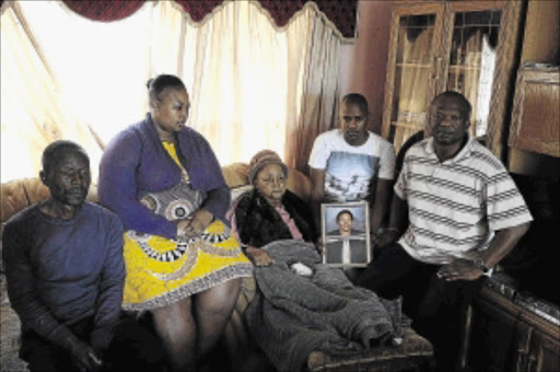 FAMILY'S AGONY: Robin Lepelle, Itumeleng Mahlwele, Irene Lepelle, Jabulani Lepelle and Mpho Mahlwele, the family of Kgomotso Mahlwele who died during the collapse of the Synagogue Church of All Nations guest house in Nigeria in September Photo: Thulani Mbele