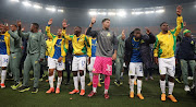 Mamelodi Sundowns captain Ronwen Williams and teammates Aubrey Modiba and Neo Maema celebrates with the fans.