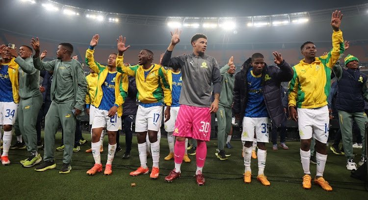 Mamelodi Sundowns captain Ronwen Williams and teammates Aubrey Modiba and Neo Maema celebrates with the fans.