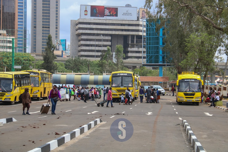 Pool of activities at Green Park bus terminal as learners are picked by their parents and guardians as schools close for their third term long holiday on November 22, 2022.