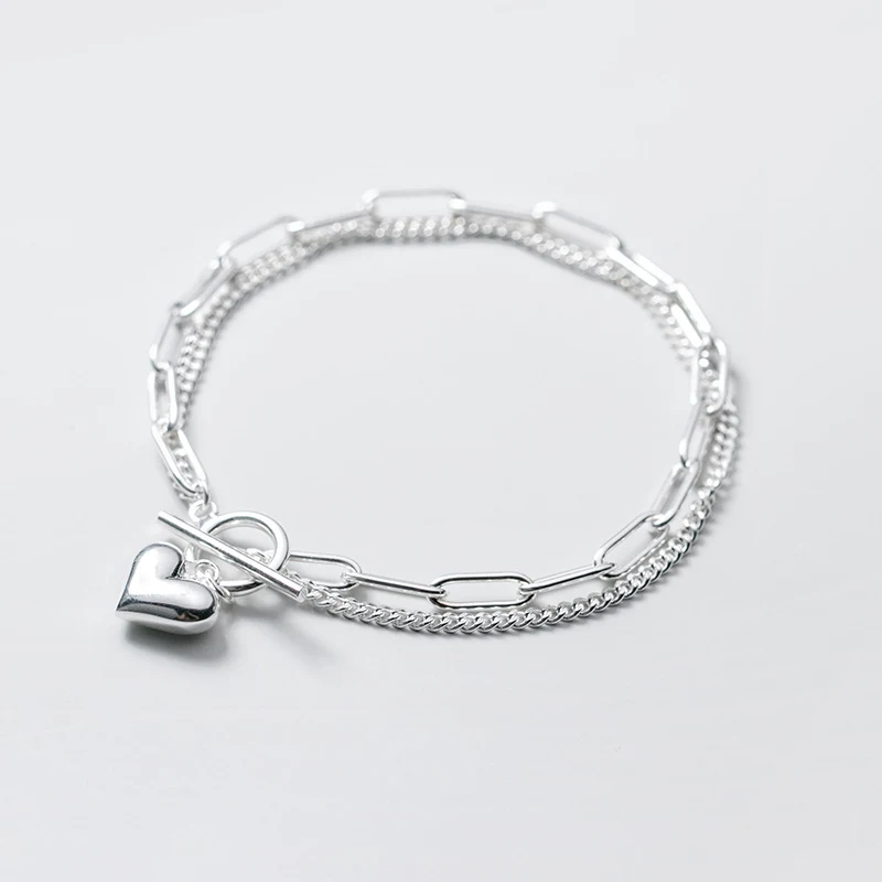 Title 2, Ring Double Design Herz Geometrie Armband. Dies...