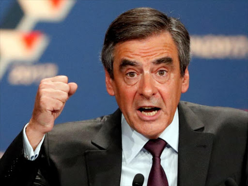 French politician Francois Fillon, member of the conservative Les Republicains political party, attends a final rally ahead of Sunday's first round of vote to choose the conservative candidate for France's presidential election in Paris, France, November 18, 2016. /REUTERS