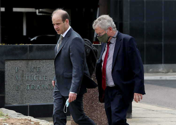 Former Tongaat Hulett CEO Peter Staude, right, leaving the Durban magistrate's court on Thursday, where he has been implicated in a R1.5bn fraud matter.