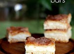 Sopapilla Cheesecake Bars was pinched from <a href="http://cookiesandcups.com/sopapilla-cheesecake/" target="_blank">cookiesandcups.com.</a>