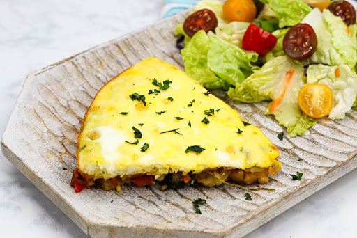 A Frittata slice on a plate.