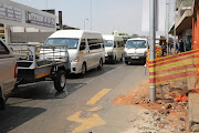 A construction company that installed street lights in the middle of a demarcated parking in the Roodepoort CBD says the gaffe was as a result of drawing mistake.