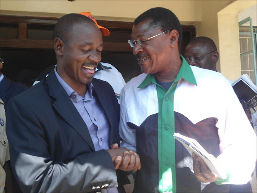 A file photo of veteran journalist David Makali with Ford Kenya leader Moses Wetang'ula. /JOHN NALIANYA