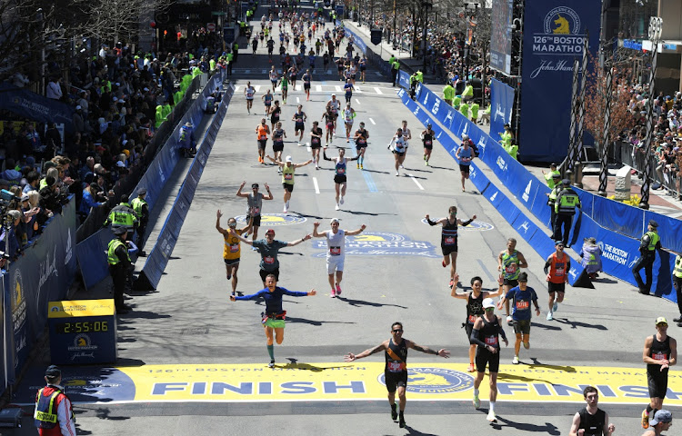 Runners make their way down Boylston Street to the finish line of the 126th Boston Marathon in Boston, Massachusetts, US April 18 2022. Picture: REUTERS/FAITH NINIVAGGI