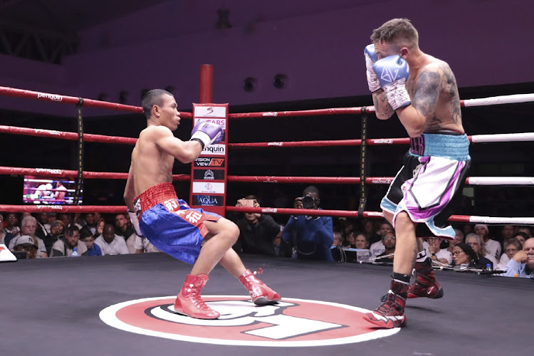 Hekkie Budler sends Wichet Sangprakhon to the slumberland at Unisa conference hall in Ormonde at the weekend during the Boxing 5 tournament.