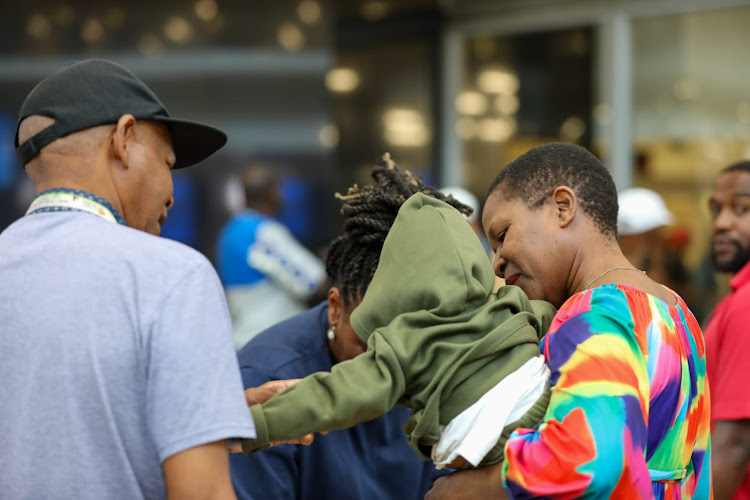 An emotional moment at OR Tambo International Airport in Johannesburg when a department of social development social worker handed over the child to the Eastern Cape department of social development.