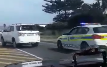 The SUV tries to evade police during the chase.