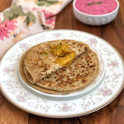 Tawa Onion Paratha With Raita And Butter