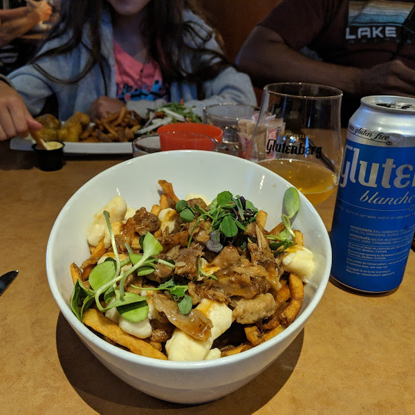 Family of four all gluten free. The parents had gluten free poutine  which was a special treat. Our daughter had gluten free chicken nuggets and our son the vegetarian,  had the mushroom risotto.