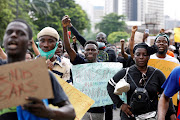 Nigerians take part in a protest against alleged violence, extortion and harassment from Nigeria’s Special Anti-Robbery Squad (Sars) in Lagos. 