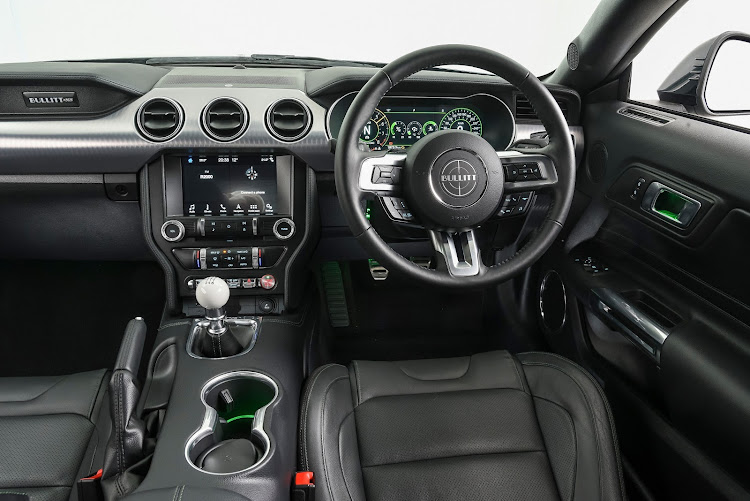 The ‘cue ball’ manual gear lever takes pride of place in this purist Mustang. Picture: SUPPLIED