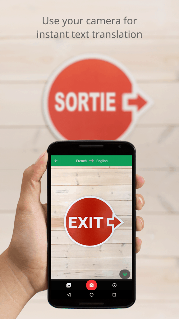 a phone displaying an app that scans signs and can translate them on your phone using the camera feature