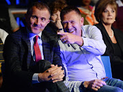 Orlando Pirates' coach Milutin Sredojevic (L) shares a light moment with his Chippa United counterpart Eric Tinkler (R) during the launch and draw of the Telkom Knockout cup in Johannesburg on October 8 2018.