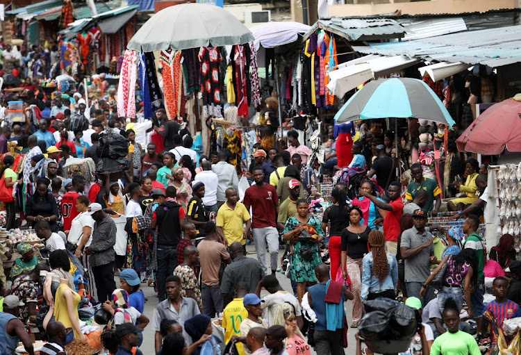 Shoppers crowd a market in Nigeria in this file photo. Police said three people were killed and 19 injured after an explosion at a market in Taraba state.