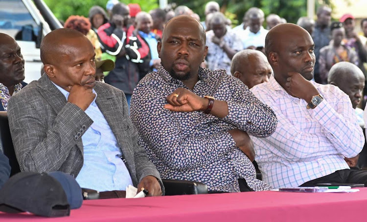 Interior CS Kithure Kindiki, his roads colleague Kipchumba Murkomen and Elgeyo Marakwet Governor WEsley Rotich at a peace meeting in Kerio Valley on January 3.