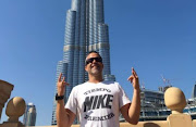 Stellenbosch businessman Justin van Pletzen in front of the iconic Burj Khalifa skyscraper in Dubai. 