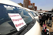 The Wanderers taxi rank in Johannesburg is a hive of activity in December  as people who live and work in Gauteng travel their homed in  different provinces and holiday destinations. /Gallo Images