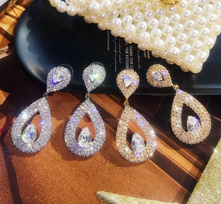 Boucles d'oreilles longues Super Rhinestone pour femmes, personnalisées, avec tempérament, les gouttes d'oreilles parfaites pour sublimer votre style.
