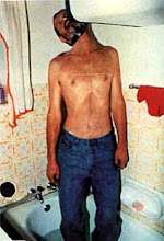 Photo: Afrikaner farmer hung in his bathroom Pietersburg January 5 1998. Torture is a major feature of the 'farm-murders' targetting white rural families in South Africa