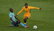 Ben Motshwari of Orlando Pirates and Njabulo Blom of Kaizer Chiefs during the Carling Black Label Cup match between Pirates and Chiefs at Orlando Stadium on August 1, 2021 in Johannesburg.