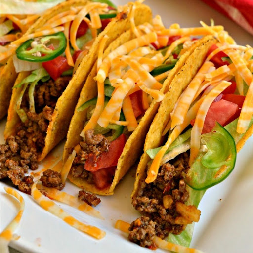 These scrumptious ground beef tacos with homemade taco seasoning are easy and quick for busy family weeknight meals.  Be sure to read the section of the post on the best taco toppings.