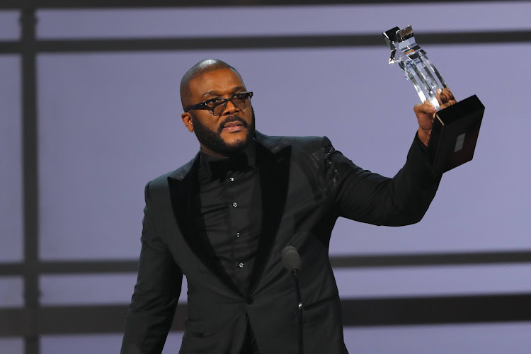 Tyler Perry accepts the Ultimate Icon award.