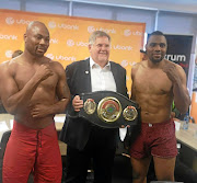 WBA's Gerald Ramsden is flanked by Willbeforce Shihepo, left, and WBA Pan African cruiserweight champion Akani Phuzi. 