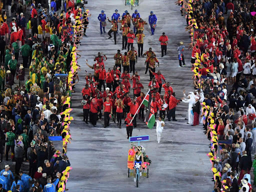 2016 Rio Olympics - Opening ceremony - Maracana - Rio de Janeiro, Brazil - 05/08/2016. Flagbearer Shehzana Anwar (KEN) of Kenya leads her contingent during the opening ceremony /REUTERS