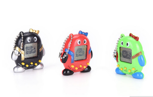 Title 4, Q Penguin Electronic Pet Game Console Mini. Por...