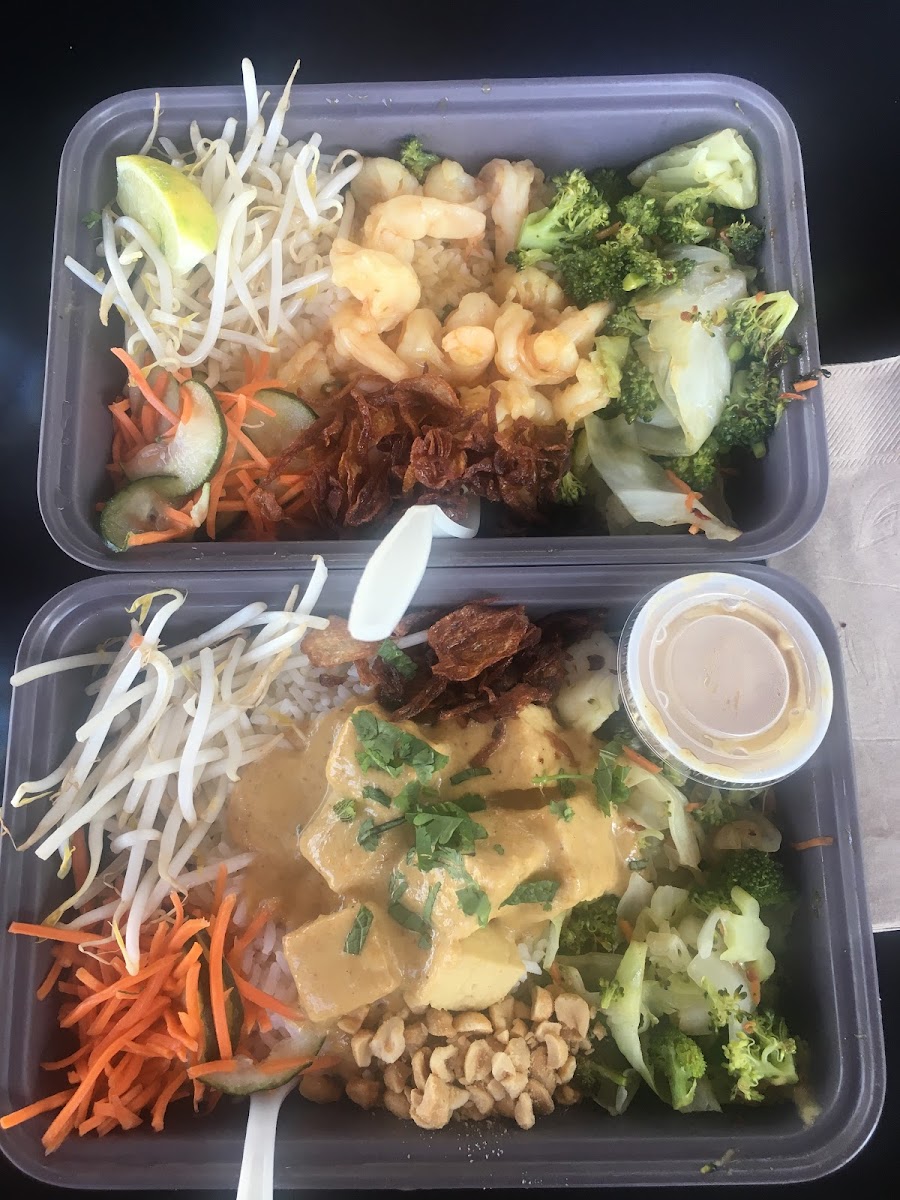 Build-Your-Own boxes! His (top): jasmine rice + shrimp + multiple toppings + fish sauce. Hers (bottom): jasmine rice + tofu + all toppings (except jalapeños) + yellow curry sauce. So good!