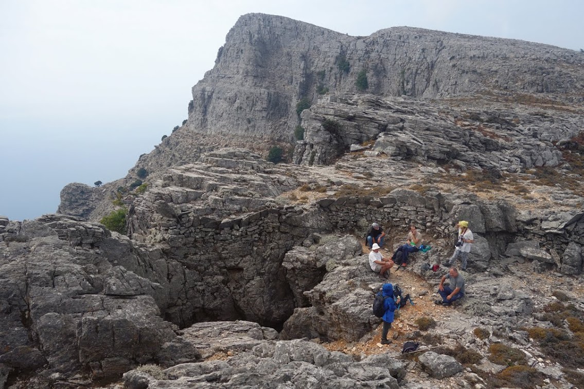 Hikers resting between the crests