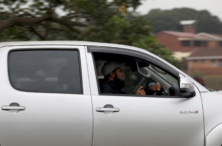 A motorist was caught on camera when he fired gunshots to disperse protesting Bhambayi community members.