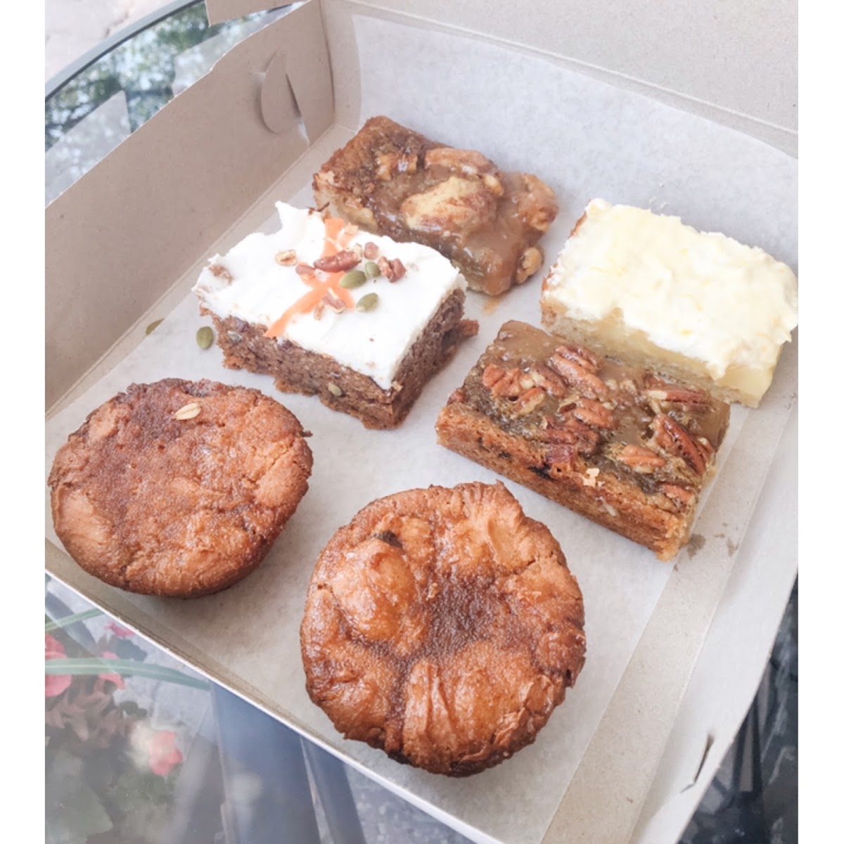 Cinnamon bun muffins, carrot cake, lemon square, butter tart square, apple pie square