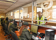 Government officials working at the Beitbridge border post.