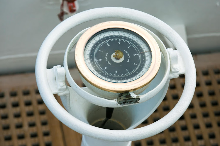 A classic navigation device on the bridge deck of Wind Surf. 