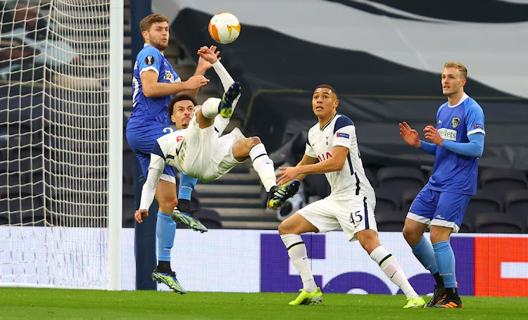 Dele Alli of Tottenham Hotspur scores with a overhead kick during the UEFA Europa League Round of 32 match against Wolfsberger at The Tottenham Hotspur Stadium on February 24, 2021 in London