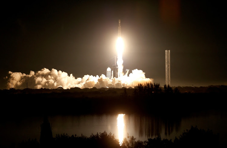 The US military's secretive X-37B robot spaceplane lifts off on its seventh mission to orbit, the vehicle's first launch atop a SpaceX Falcon Heavy rocket, from the Kennedy Space Centre in Cape Canaveral, Florida, on December 28 2023. Picture: REUTERS/JOE SKIPPER/TPX IMAGES OF THE DAY