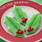 Mickey's Holly Leaf Christmas Cookies was pinched from <a href="http://spoonful.com/recipes/mickeys-holly-leaf-christmas-cookies" target="_blank">spoonful.com.</a>