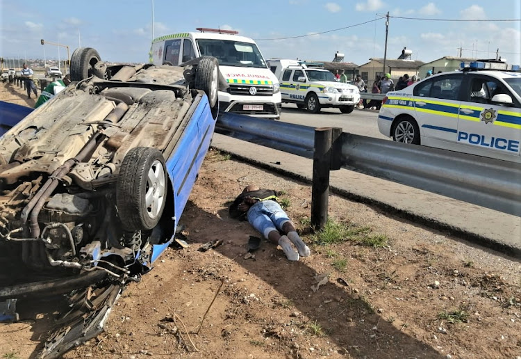 WILD RIDE: Three alleged hijackers were arrested on Sunday morning after a high-speed chase with police resulted in them crashing the car in Uitenhage Road