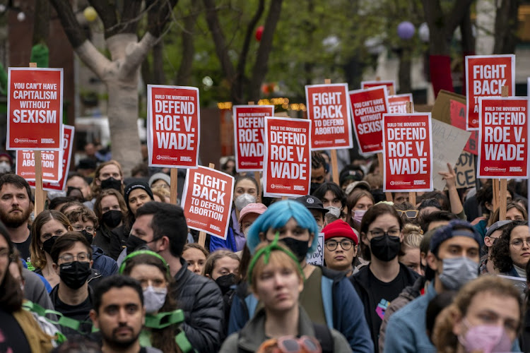 Demonstrators attend a rally in support of abortion rights on May 3, 2022 in Seattle, Washington. A leaked draft opinion by Justice Samuel Alito has suggested that the U.S. Supreme Court is poised to overturn Roe v. Wade, a historic ruling that gives women in America the ability to legally have abortions.