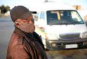 Abraham Maditsi, a taxi driver, now works split shifts due to the lockdown and is forced to carry fewer passengers.